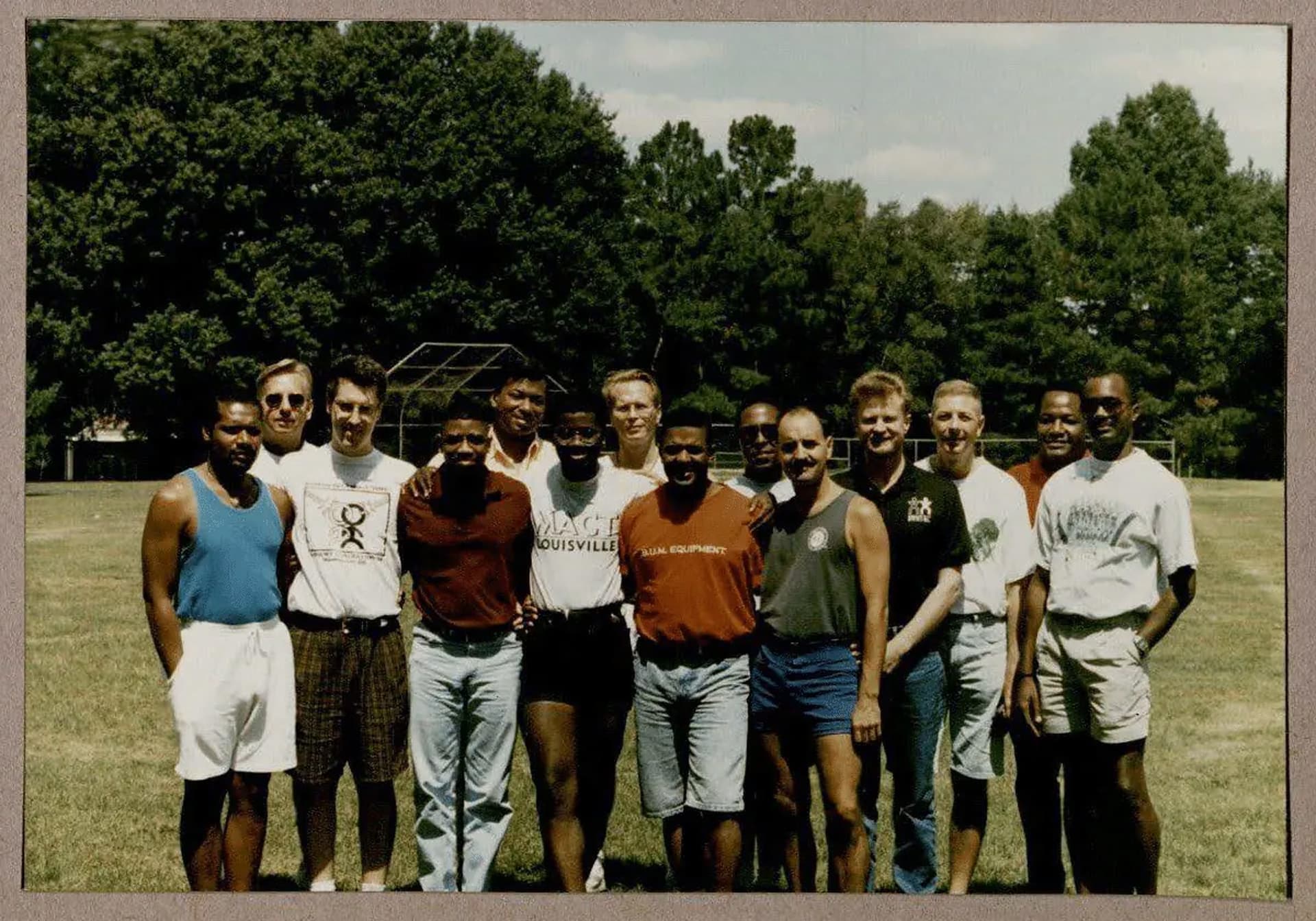 a group of people gathered at a soccer field