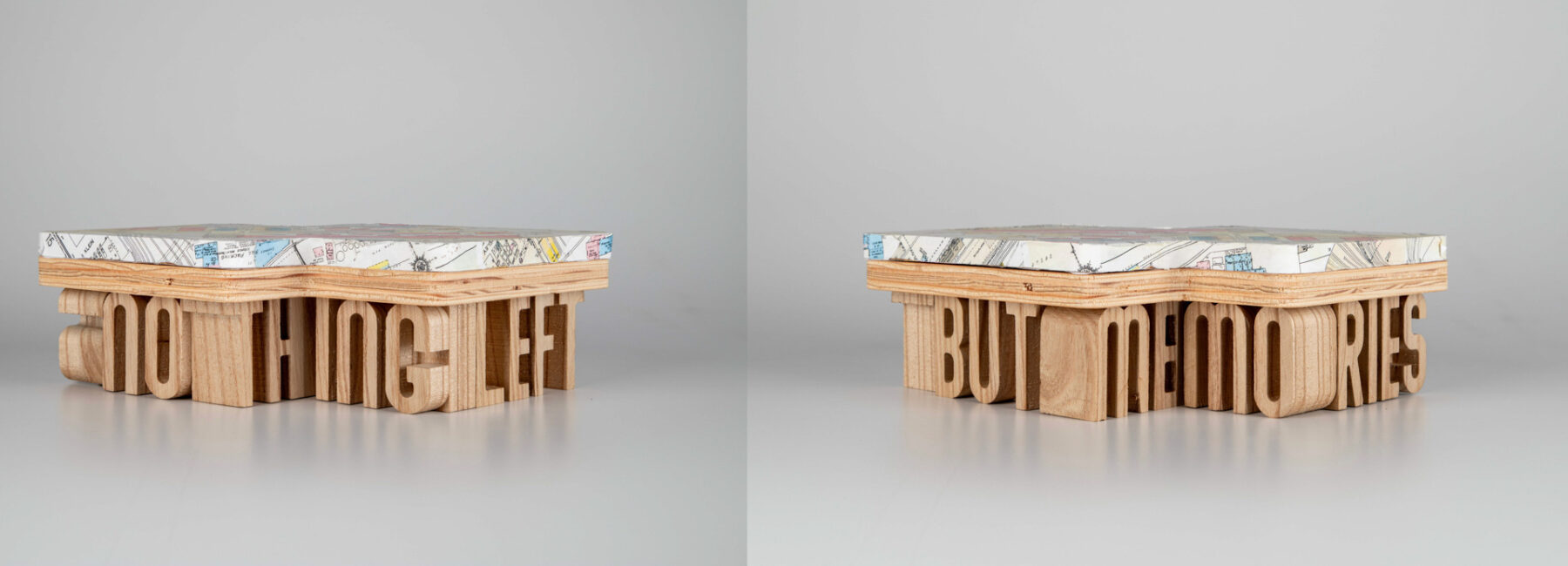 Benches made from wooden blocks with words (nothing left but memories) as their base created by artisat Maria Velasco