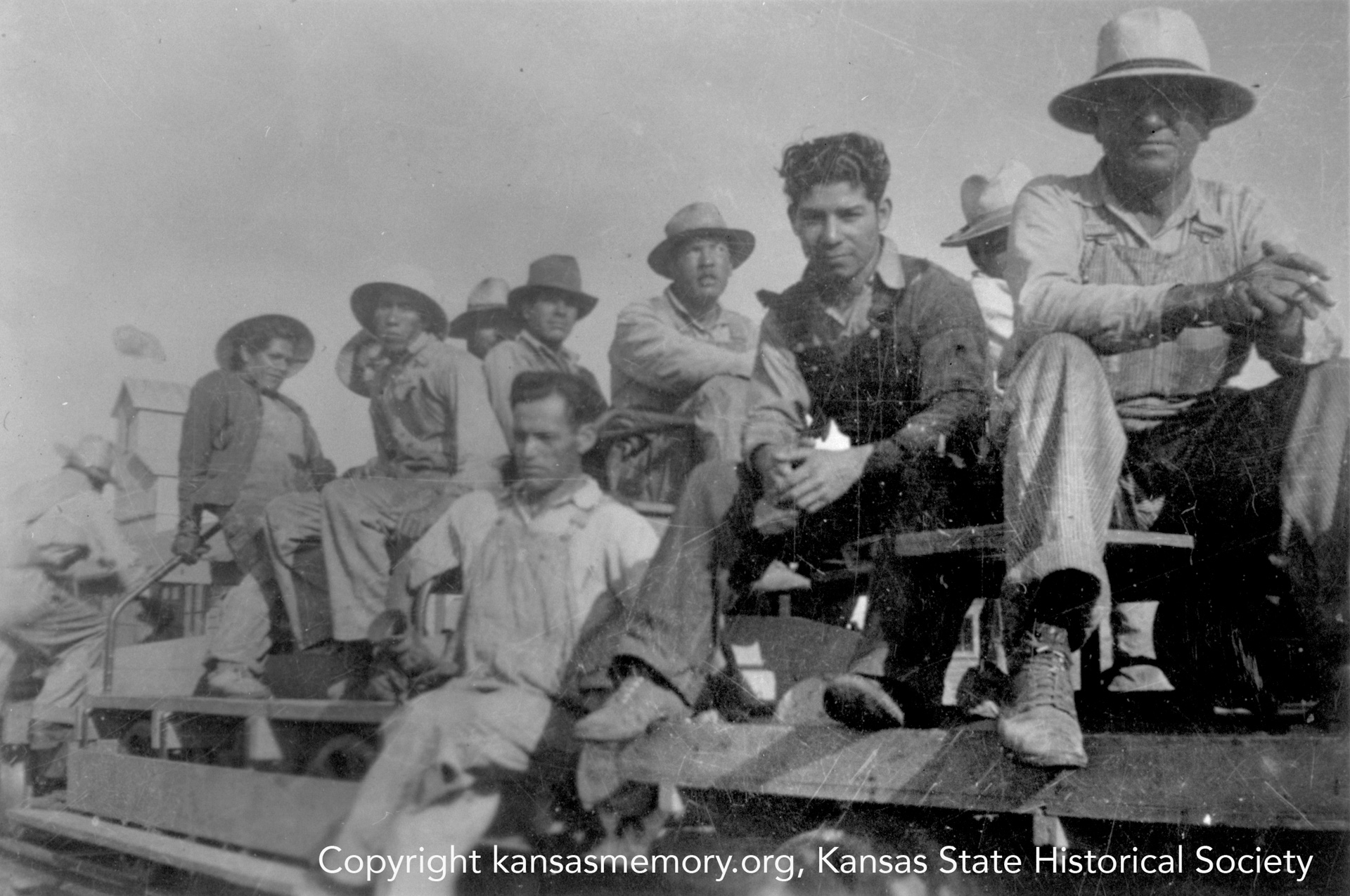 a group of workers with hats