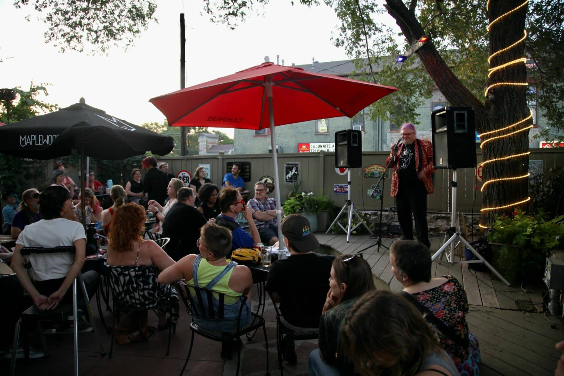 people gathered at the Gaslight for the Queer Voices event