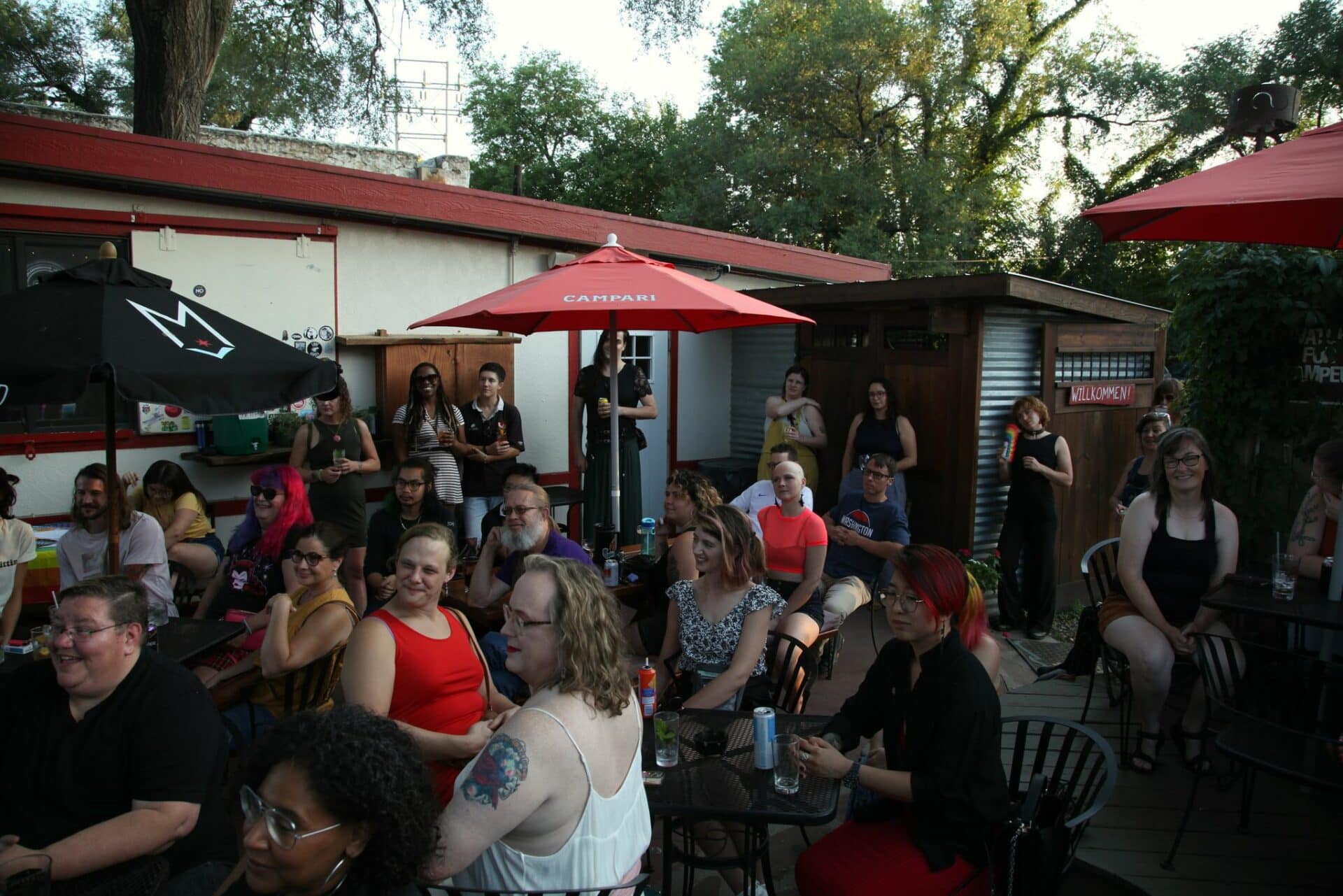 people gathered at the Gaslight for the Queer Voices event