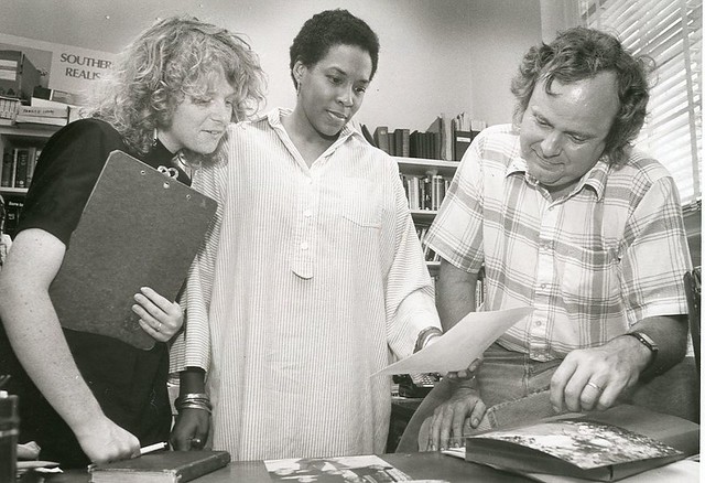 A black and white photo of people working on HBW