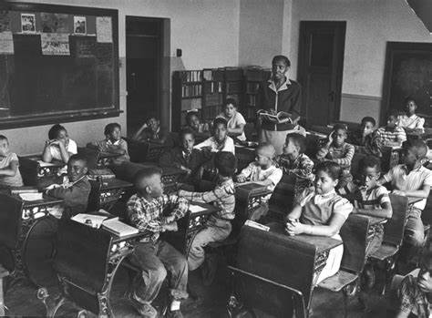 A black and white photo of students in a classroom