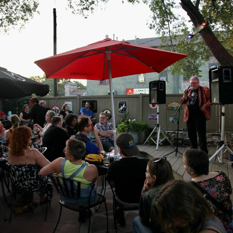 people gathered at the Gaslight for the Queer Voices event