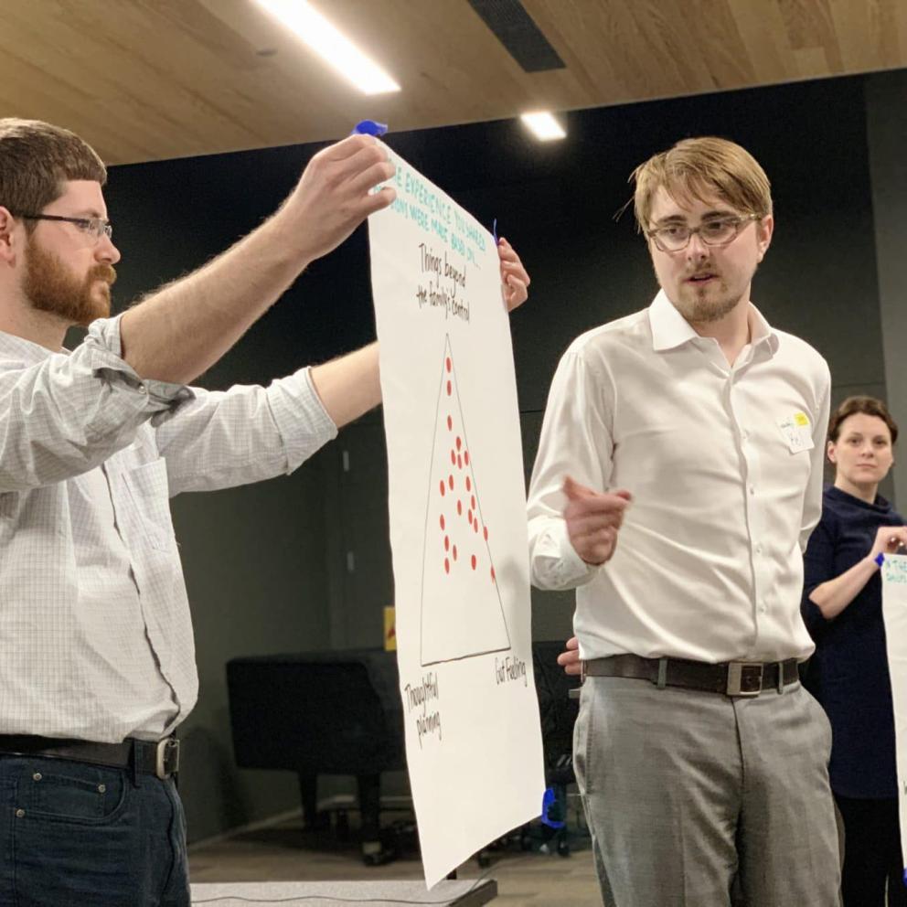 People presenting data about a project